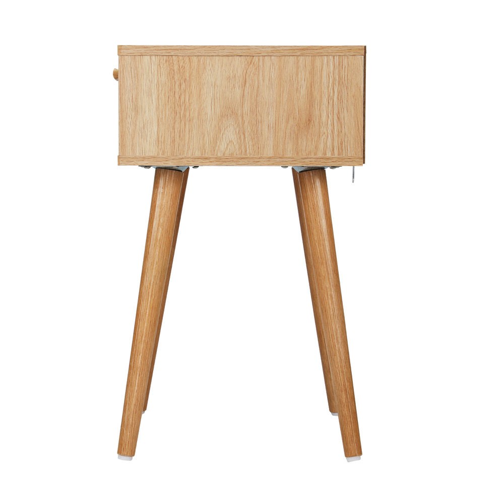 Rattan Bedside Table in natural wood — angled view